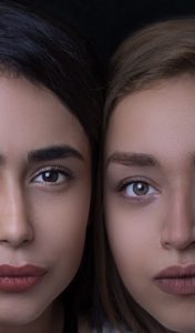 photo of two young women's faces with very subtle makeup