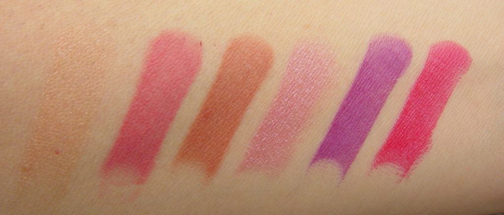 swatches of six lipstick colors on an arm with light skin